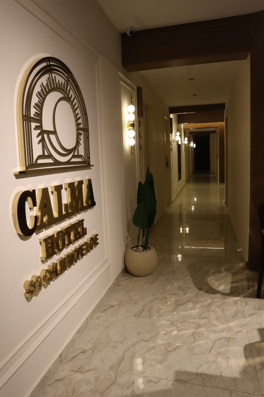 Cozy Hallway with Local Art — Calma Hotel Cairo